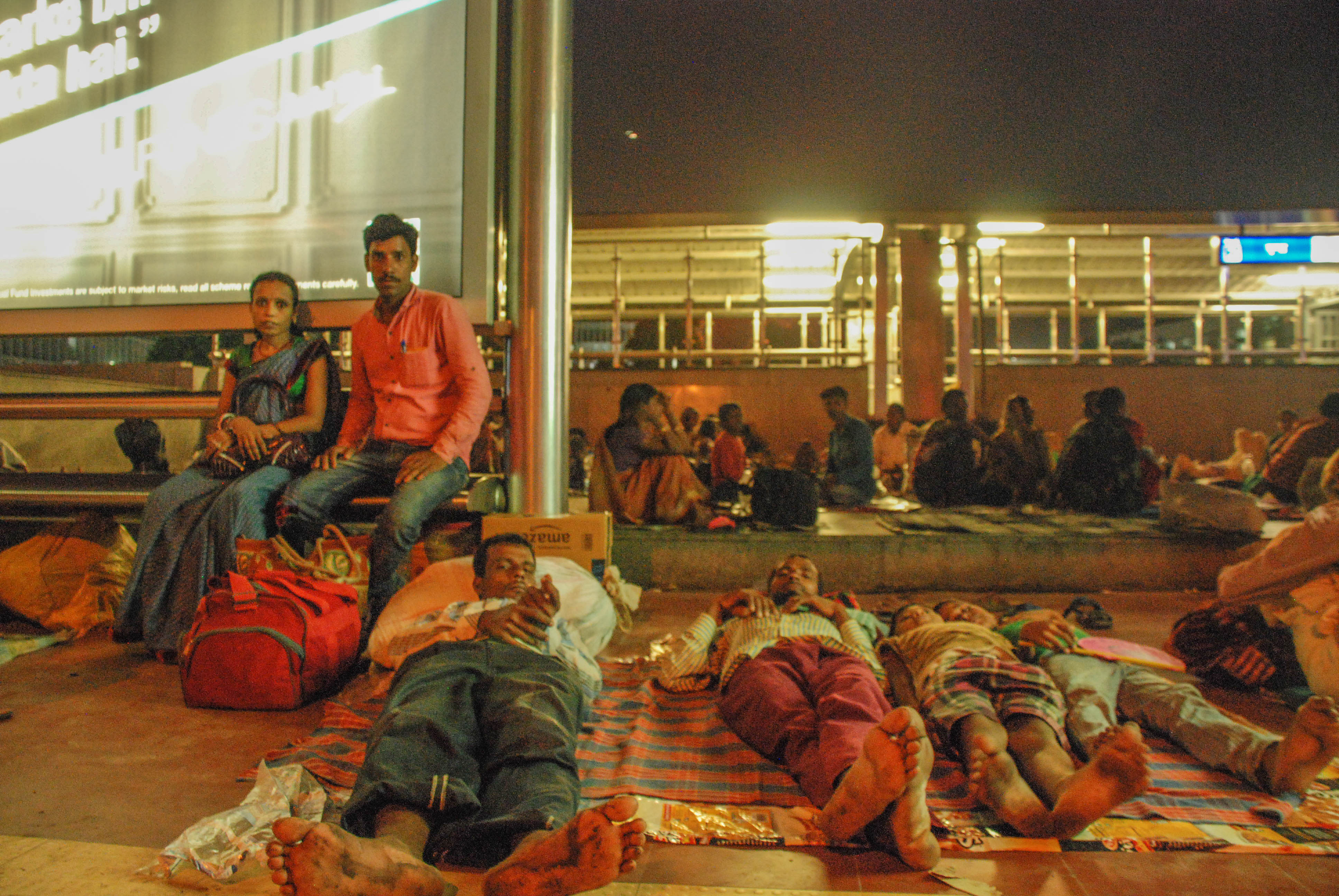 Ultimately after day full of miseries they find peace and fall asleep on Bus stand and metro station.